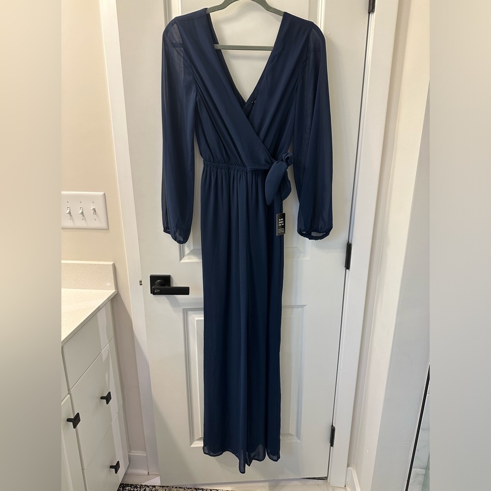 Express blue long sleeve jumpsuit. Size XS. Brand new, never worn.